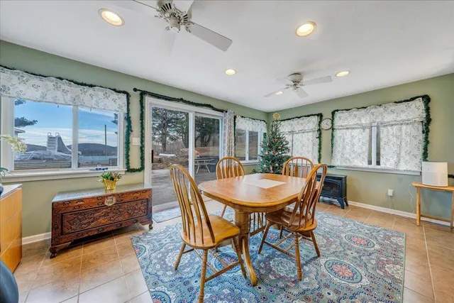 a outdoor dining space with furniture and window