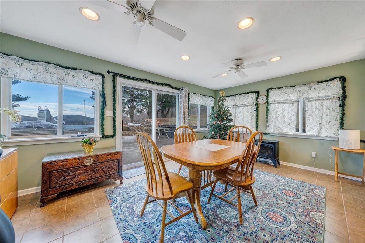 9009 Poor Mountain Road Bent Mountain, VA 24059 - Photo 8 of 30 a outdoor dining space with furniture and window