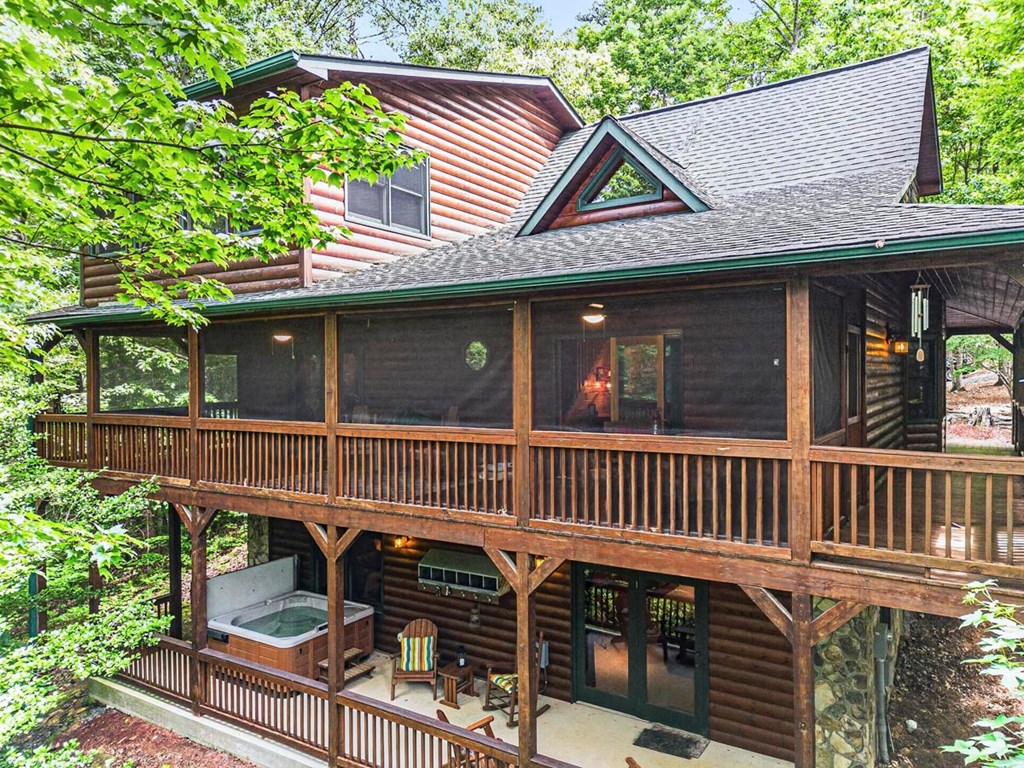 115 Lakota Trail Blue Ridge, GA 30513 - Photo 47 of 49 a view of a deck with a table and chairs