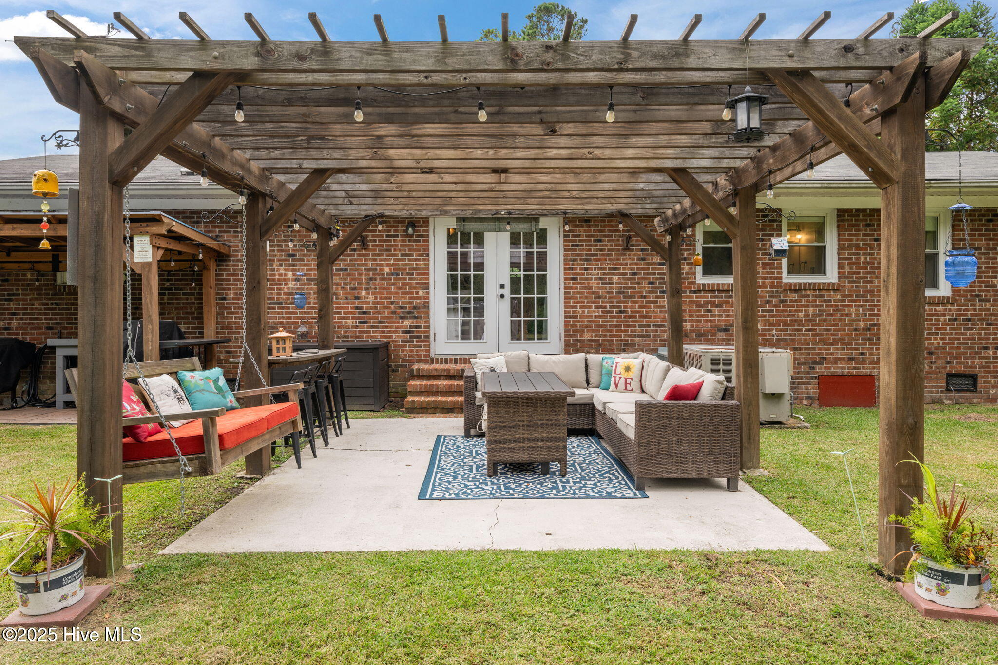 231 Church Road Havelock, NC 28532 - Photo 3 of 35 back yard patio and pergola