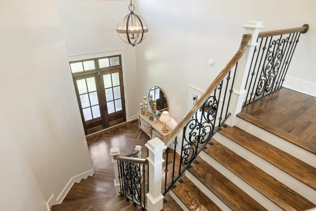 a workspace with furniture and a large window