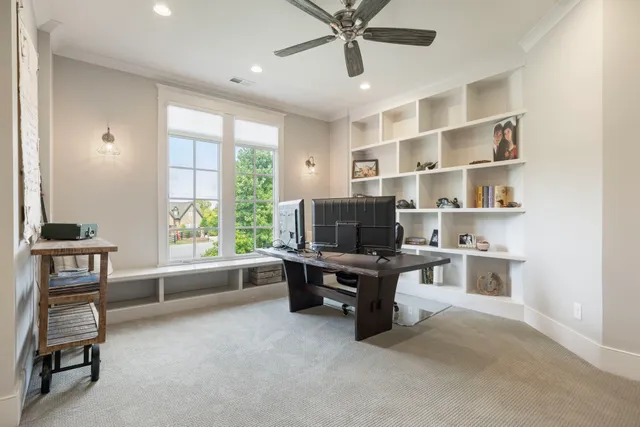 a view of a chairs and table in patio with wooden fence