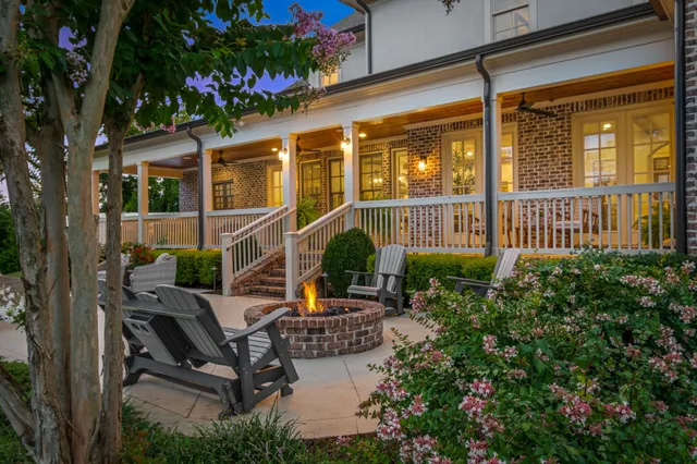 a view of an chairs and table in the garden