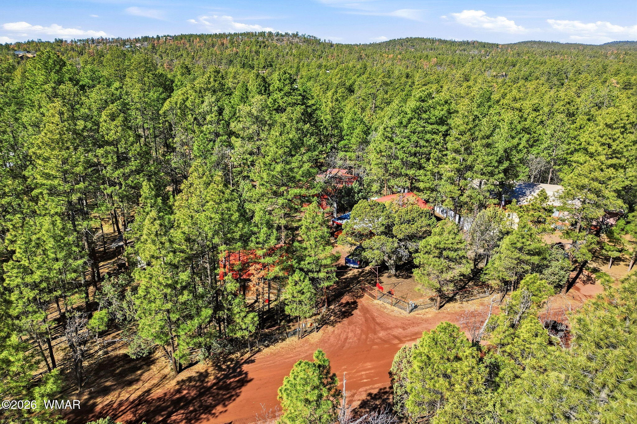 6480 Lower Ridge Drive Lakeside, AZ 85929 - Photo 27 of 32 a view of a lush green field with a lake