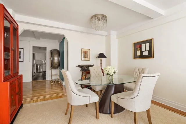 a view of a room with a table and a chair