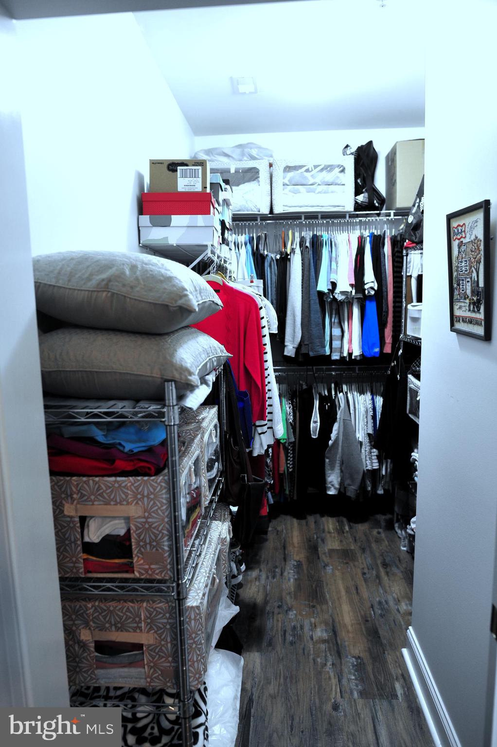 4000 Village Way, Unit 202 Boothwyn, PA 19061 - Photo 13 of 15 a view of walk in closet with clothes and shoes
