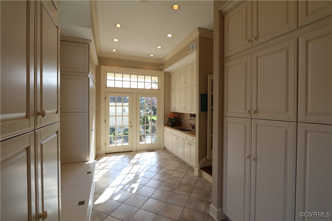 207 Massie Road Richmond, VA 23221 - Photo 26 of 50 Mud Room has floor to ceiling cabinets on both sid