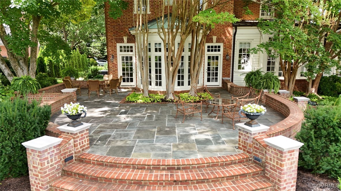 207 Massie Road Richmond, VA 23221 - Photo 45 of 50 Steps from Patio to Rear Yard. Garden statuary and