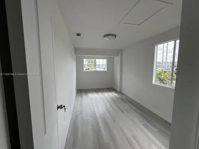 a bathroom with a sink and a rug