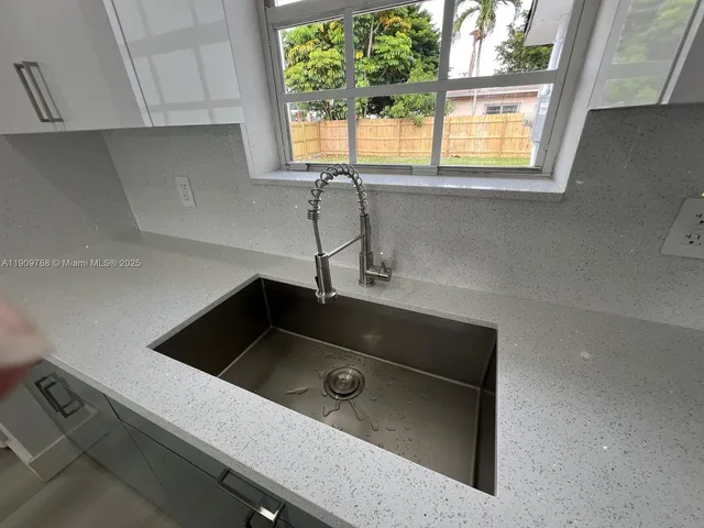 a house view with a garden space