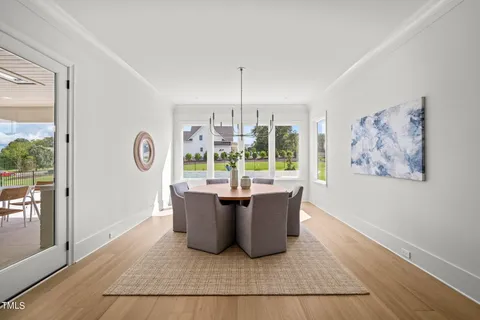a kitchen with stainless steel appliances a refrigerator sink and cabinets