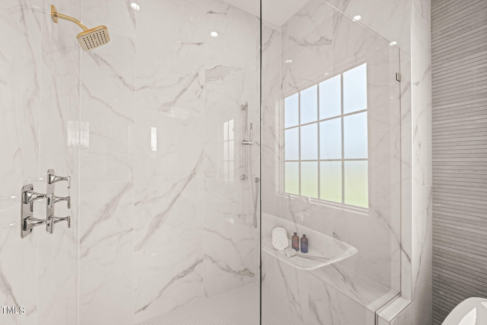 8916 Grand Highland Way Wake Forest, NC 27587 - Photo 28 of 80 a bathroom with a sink a toilet and shower