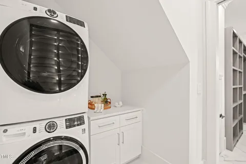 a living room with furniture and window