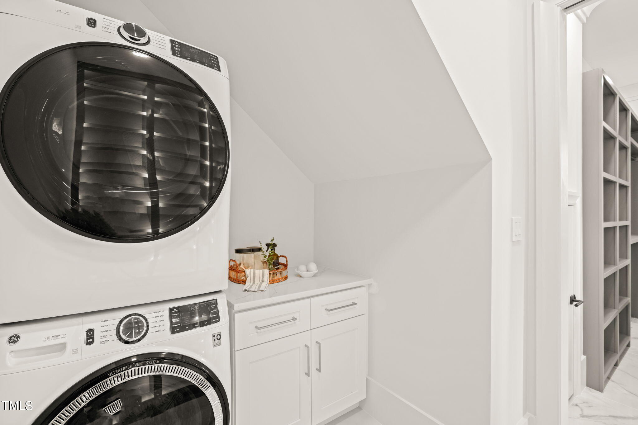 8916 Grand Highland Way Wake Forest, NC 27587 - Photo 31 of 80 a utility room with dryer and washer