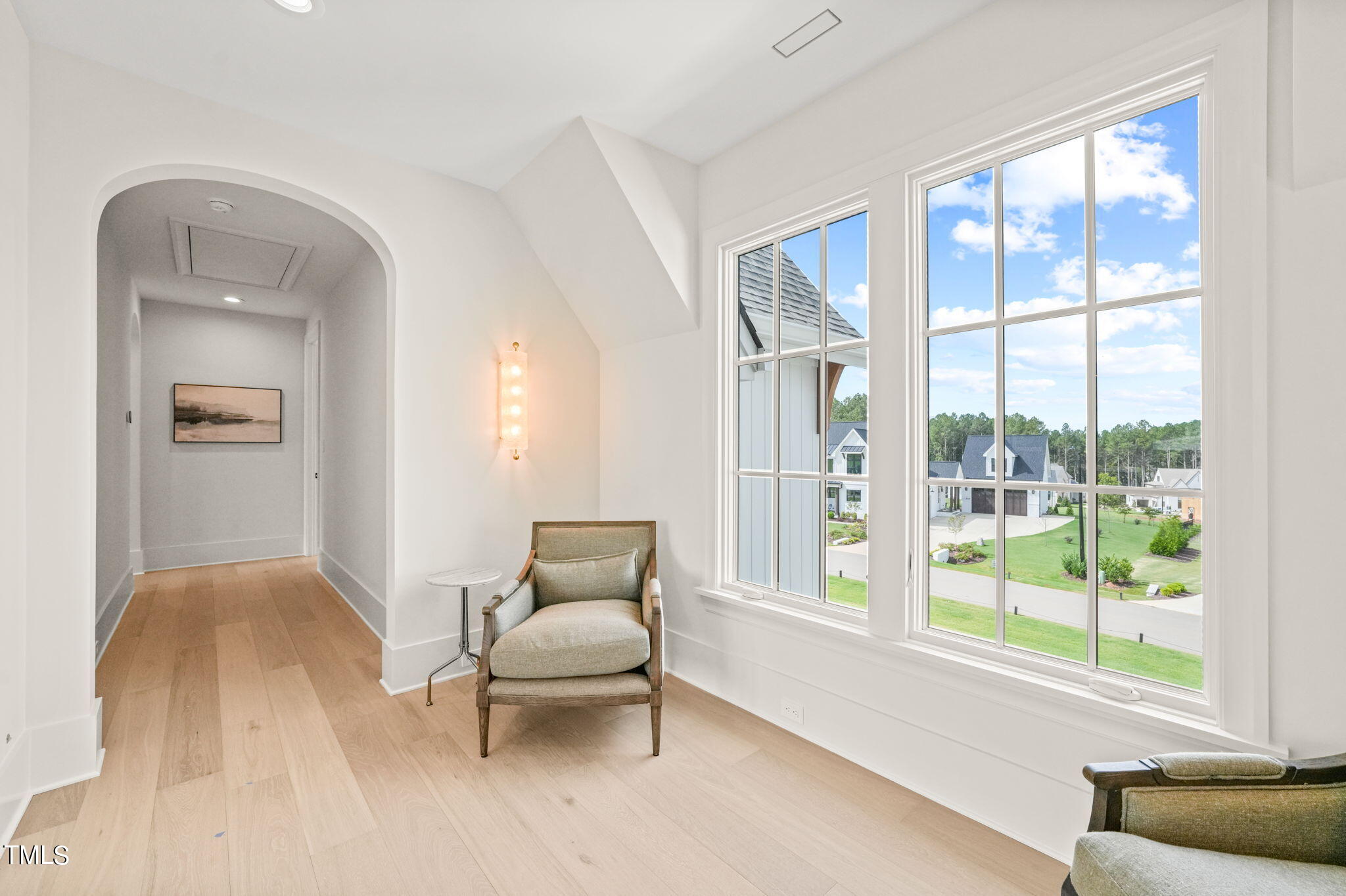 8916 Grand Highland Way Wake Forest, NC 27587 - Photo 38 of 80 a living room with furniture and a window