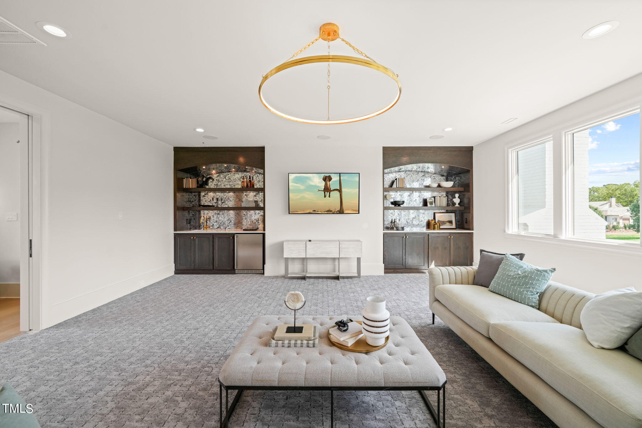 8916 Grand Highland Way Wake Forest, NC 27587 - Photo 39 of 80 a living room with furniture and a wooden floor