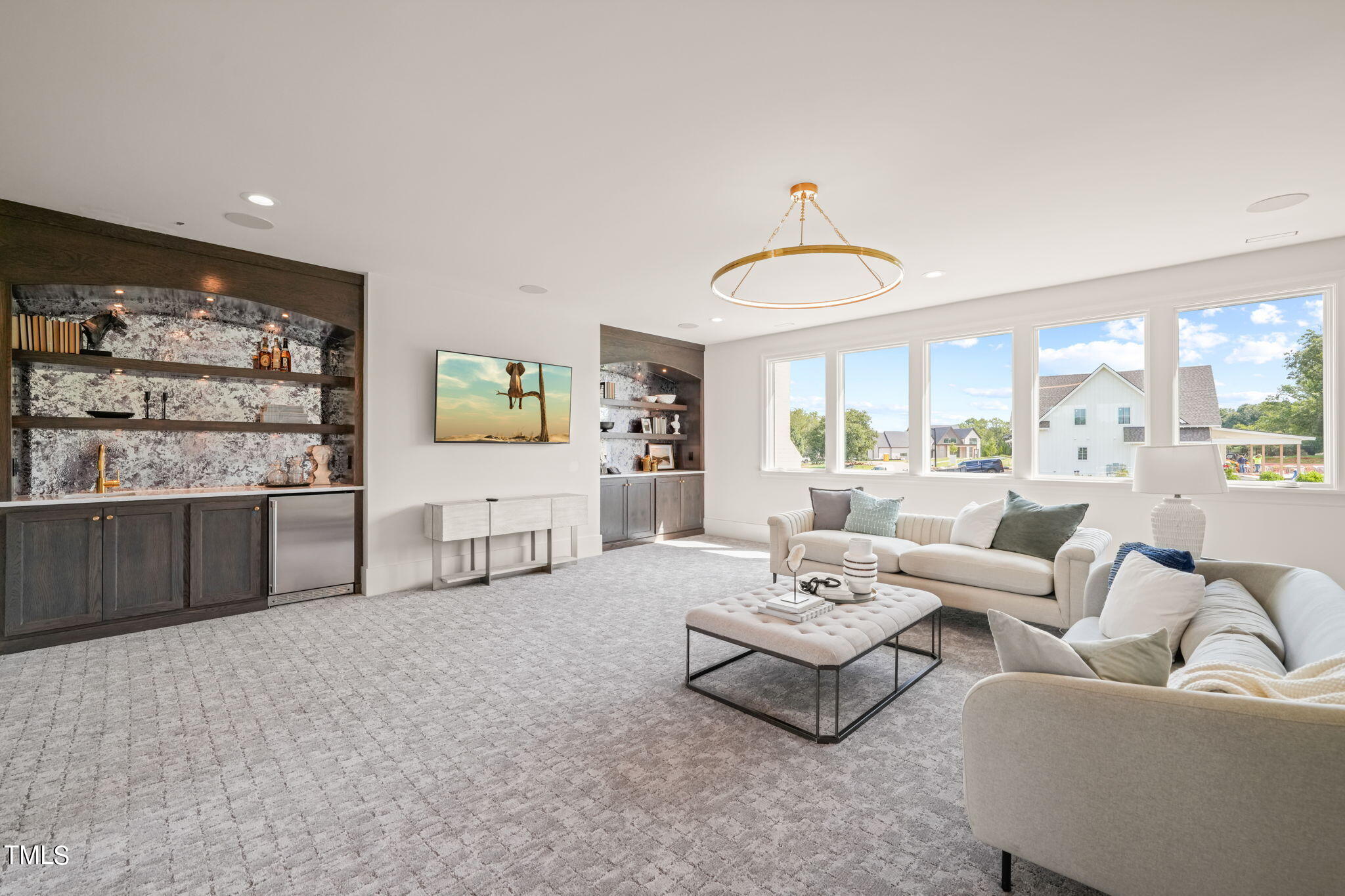 8916 Grand Highland Way Wake Forest, NC 27587 - Photo 41 of 80 a living room with furniture and large windows