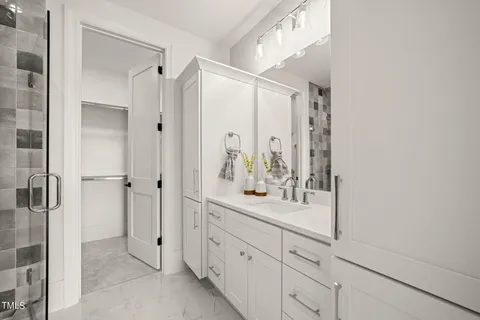 a view of a patio with a table and chairs