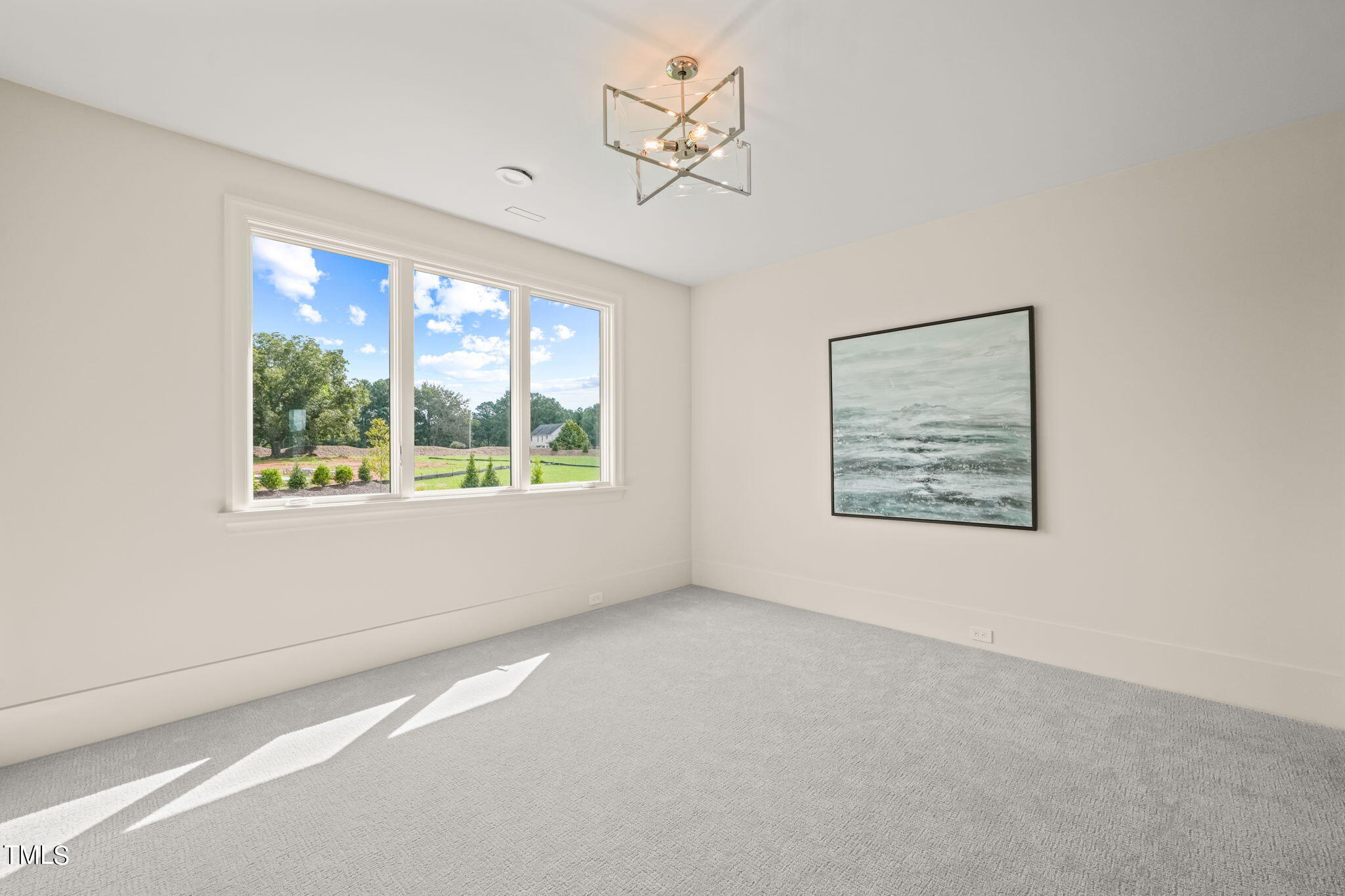 8916 Grand Highland Way Wake Forest, NC 27587 - Photo 51 of 80 an empty room with a window