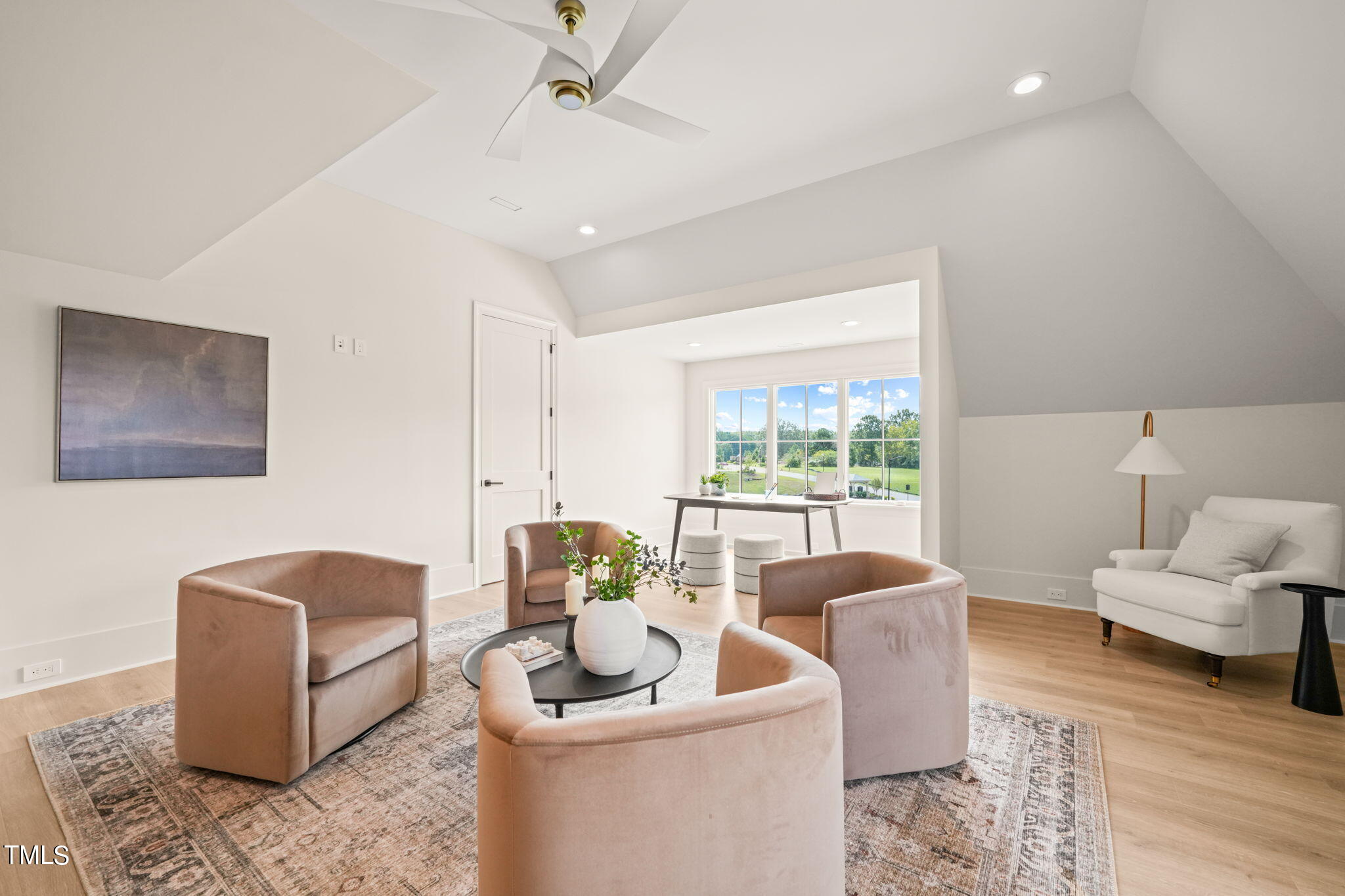 8916 Grand Highland Way Wake Forest, NC 27587 - Photo 59 of 80 a living room with furniture a couch and a window