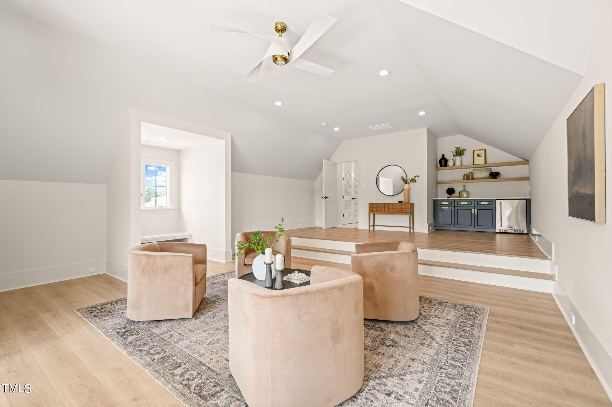 8916 Grand Highland Way Wake Forest, NC 27587 - Photo 60 of 80 a living room with furniture and wooden floor