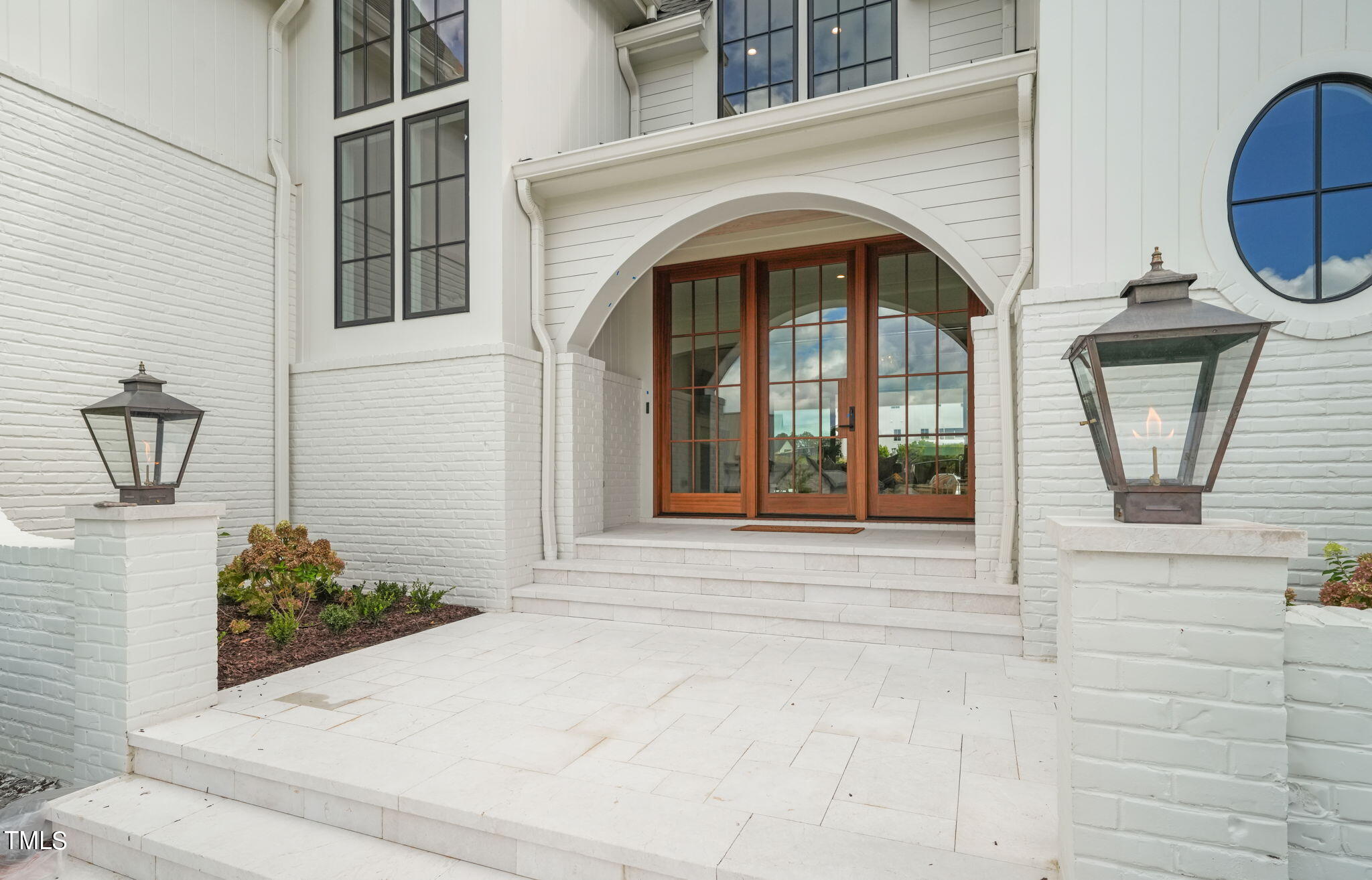 8916 Grand Highland Way Wake Forest, NC 27587 - Photo 7 of 80 a view of entrance door of the house