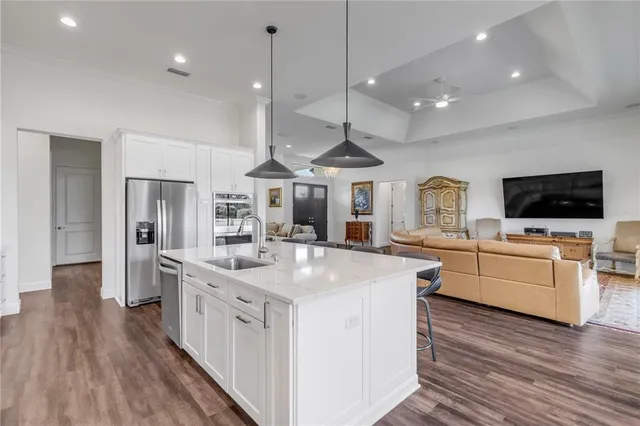 a room with window and flat screen tv