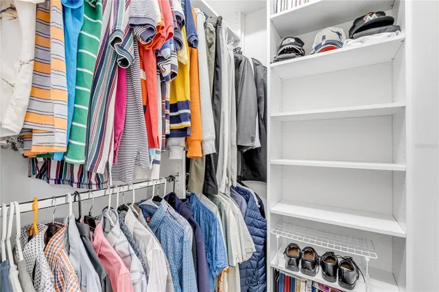 a view of a livingroom with furniture and a window