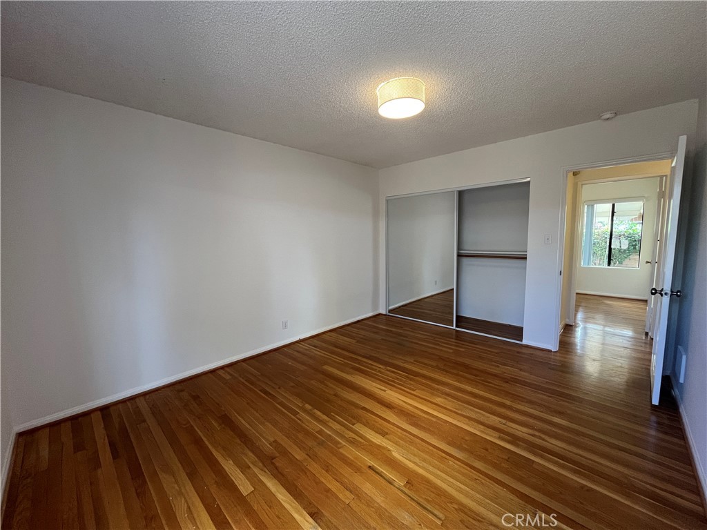 18029 Santa Rita Street Encino, CA 91316 - Photo 10 of 20 a view of empty room with wooden floor