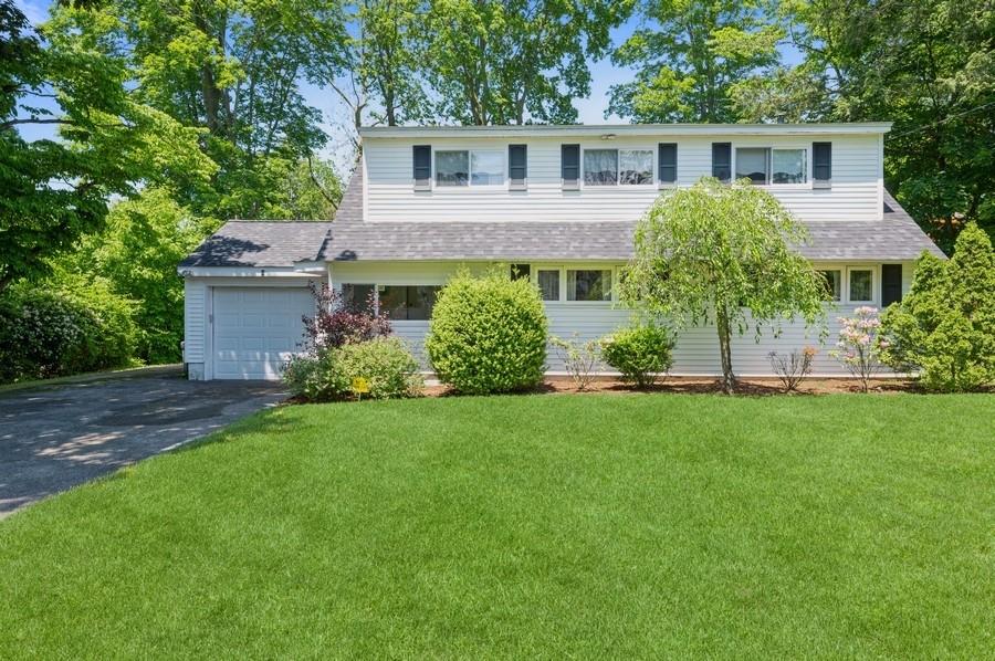 6 Jennifer Lane Rye Brook, NY 10573 - Photo 1 of 1 The right combination of foliage and sun frames this home