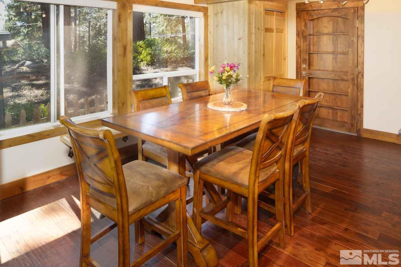633 Riven Rock Road Zephyr Cove, NV 89448 - Photo 15 of 41 a dining room with furniture and wooden floor