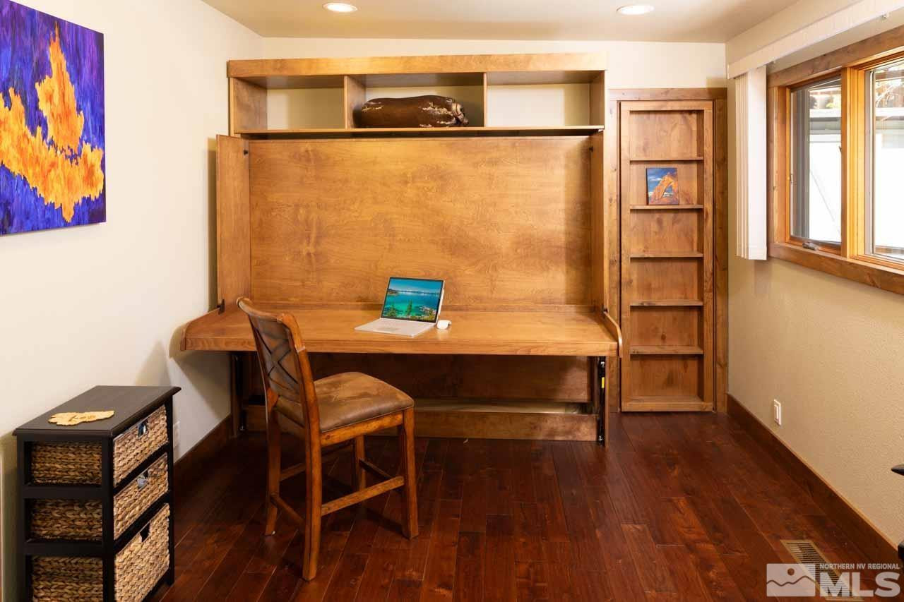 633 Riven Rock Road Zephyr Cove, NV 89448 - Photo 17 of 41 a view of a workspace with furniture and wooden floor
