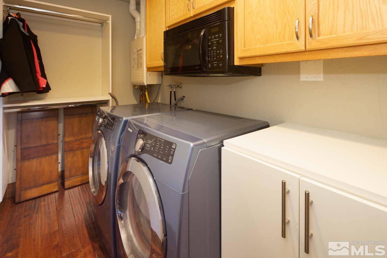 633 Riven Rock Road Zephyr Cove, NV 89448 - Photo 25 of 41 a utility room with dryer and washer