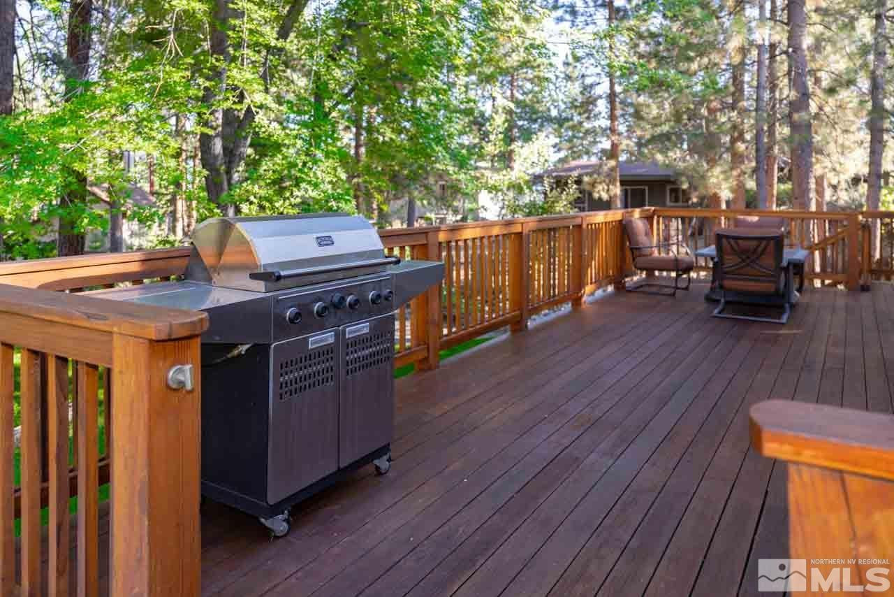 633 Riven Rock Road Zephyr Cove, NV 89448 - Photo 29 of 41 a view of a deck with wooden floor and outdoor seating