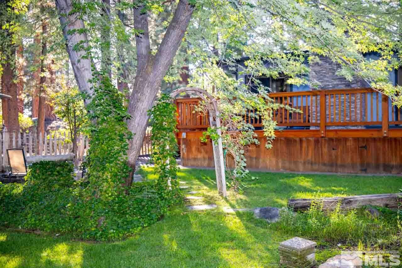 633 Riven Rock Road Zephyr Cove, NV 89448 - Photo 33 of 41 a backyard of a house with lots of green space