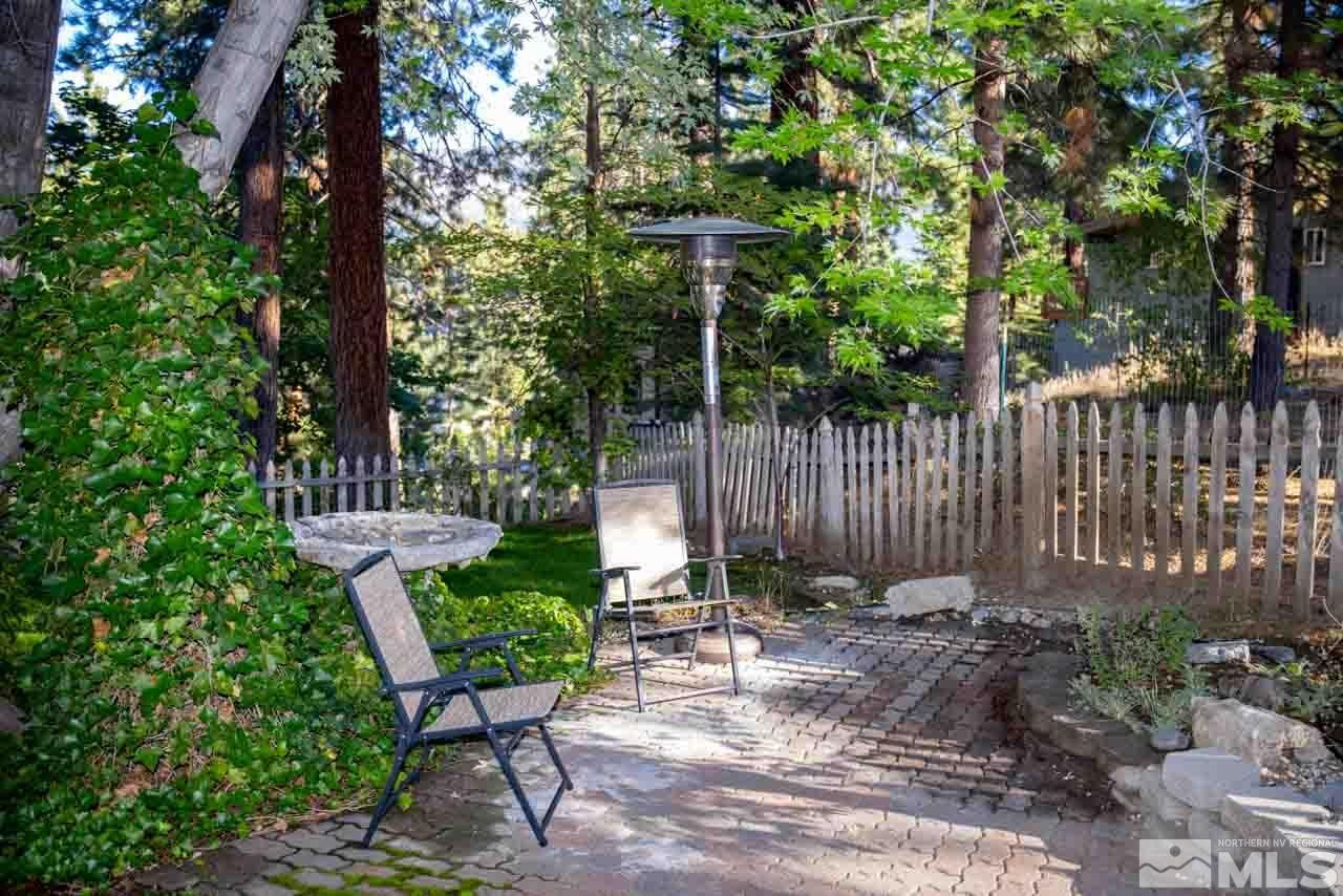 633 Riven Rock Road Zephyr Cove, NV 89448 - Photo 36 of 41 a view of a bench in the backyard