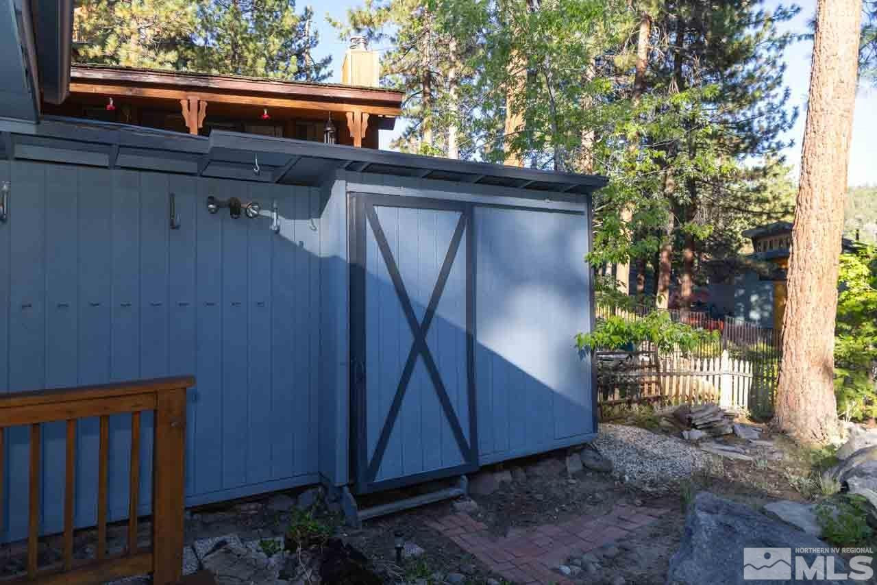 633 Riven Rock Road Zephyr Cove, NV 89448 - Photo 37 of 41 a wooden door in front of a house