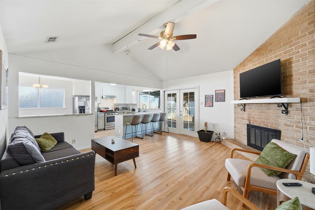 802 Buckingham Place Austin, TX 78745 - Photo 3 of 21 a living room with furniture fireplace and flat screen tv
