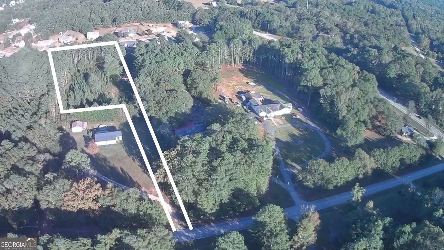 0 Wynn Road McDonough, GA 30252 - Photo 2 of 5 a view of a pathway in a yard