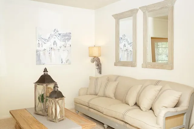 a living room with furniture and a couch