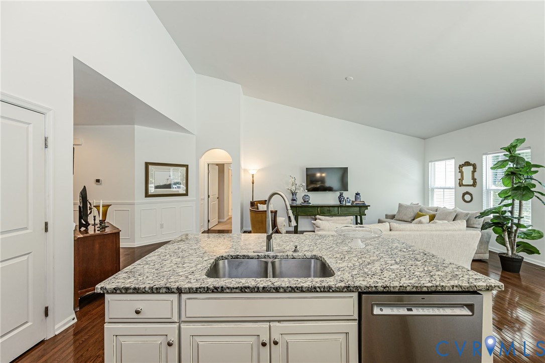 7435 Wicks Road Williamsburg, VA 23188 - Photo 34 of 82 Kitchen island featuring a double basin stainless