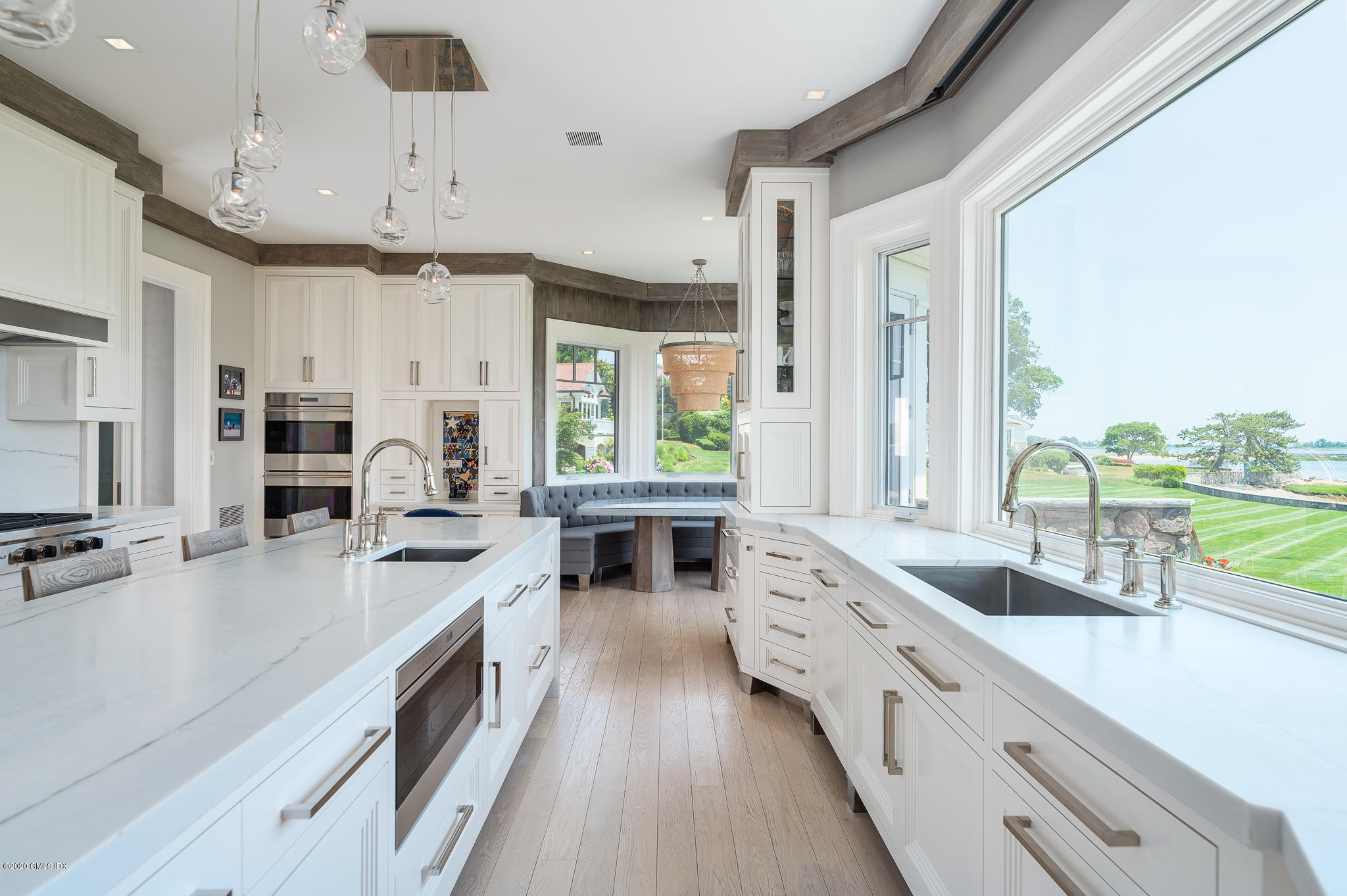 22 Pilot Rock Lane Riverside, CT 06878 - Photo 11 of 40 a large kitchen with stainless steel appliances lots of counter space and a sink
