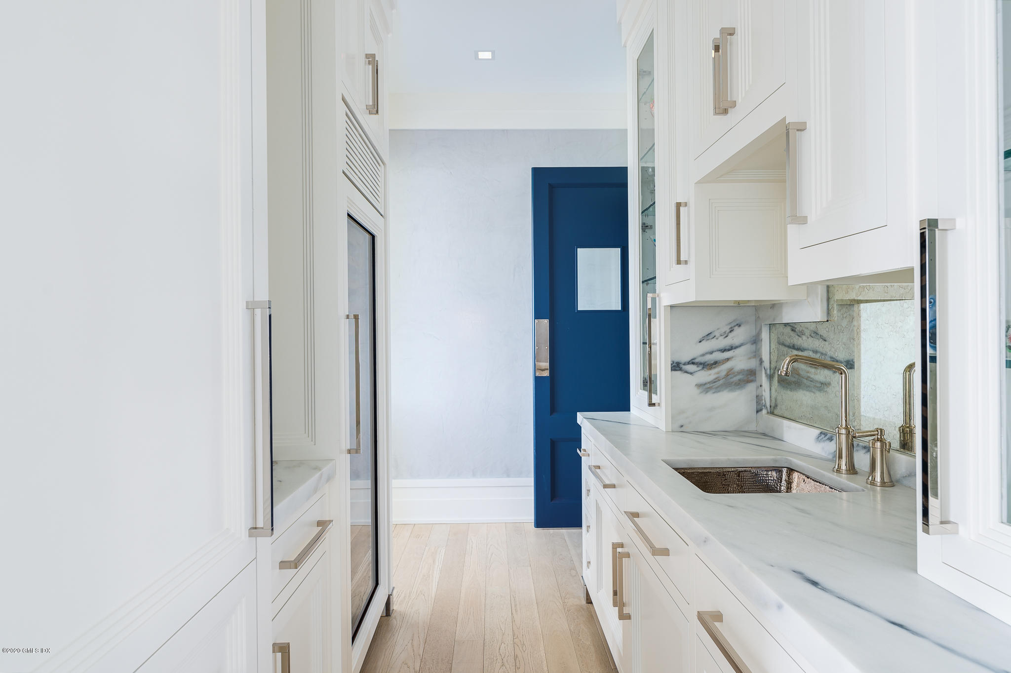 22 Pilot Rock Lane Riverside, CT 06878 - Photo 12 of 40 a kitchen with stainless steel appliances granite countertop a refrigerator and a sink