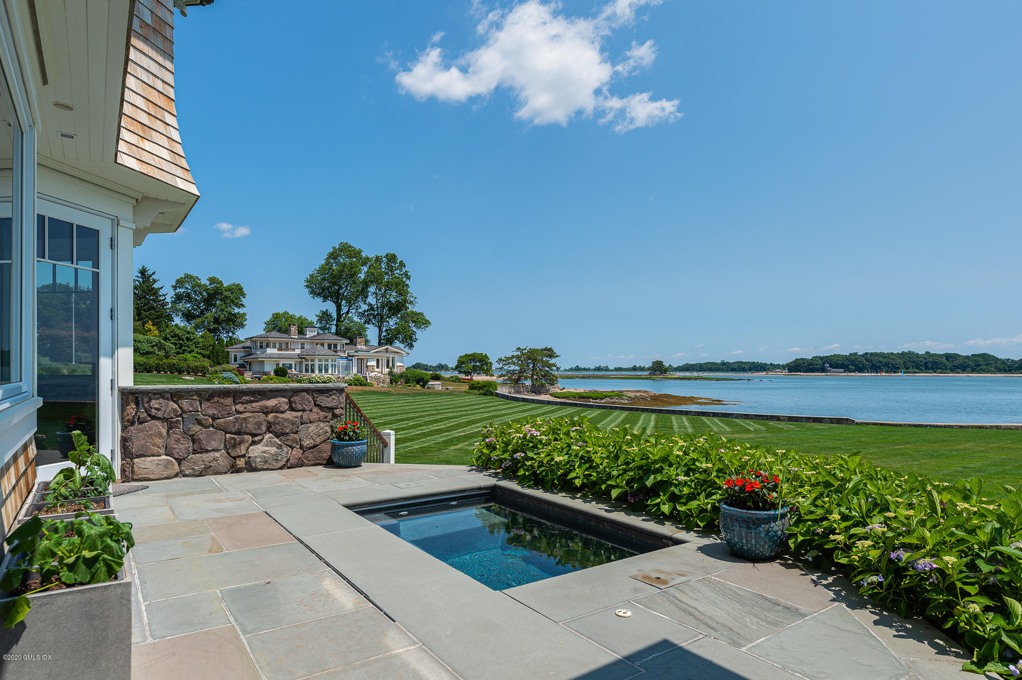 22 Pilot Rock Lane Riverside, CT 06878 - Photo 14 of 40 a view of a garden with lake view