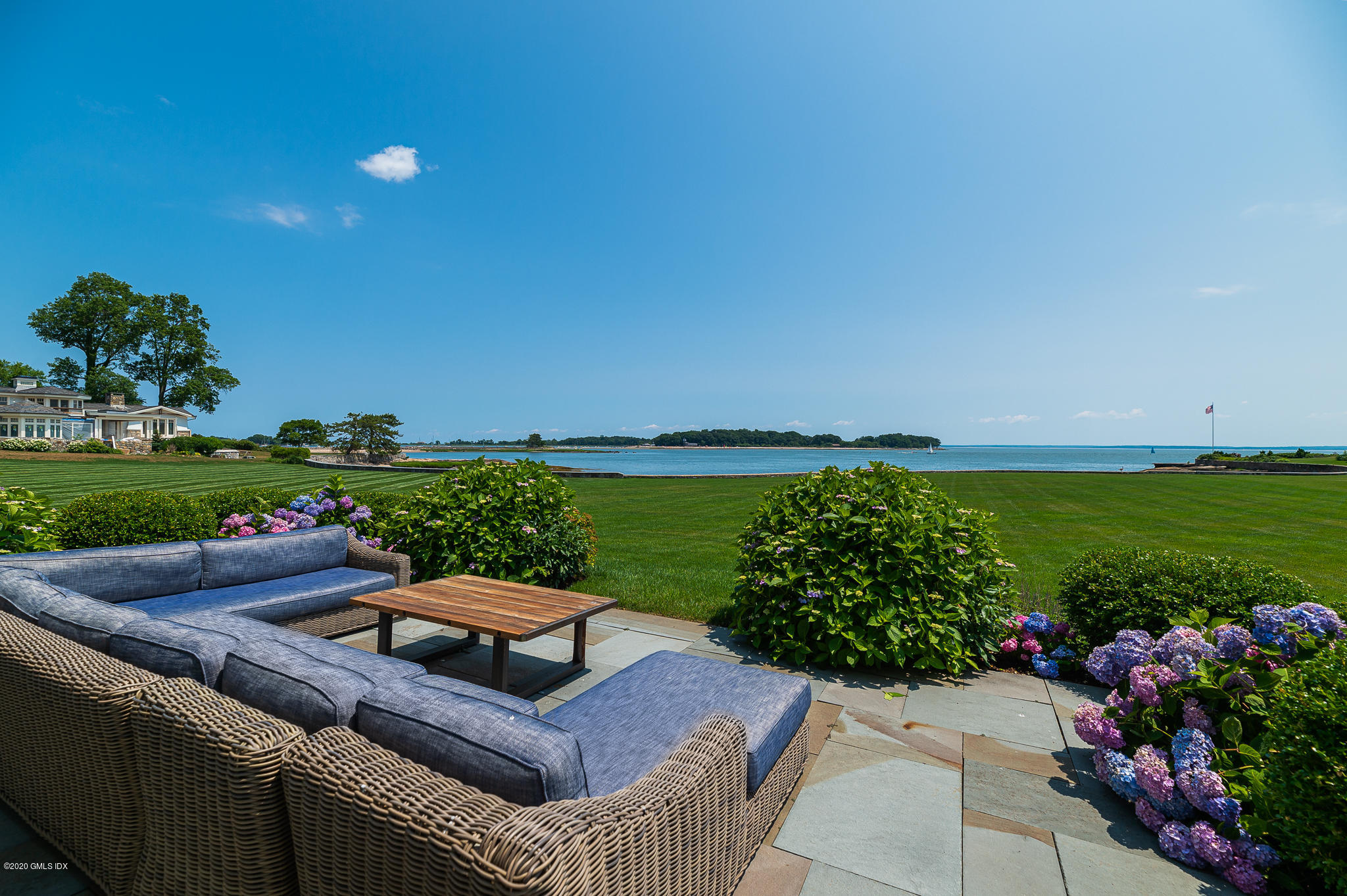 22 Pilot Rock Lane Riverside, CT 06878 - Photo 29 of 40 a garden view with a seating space