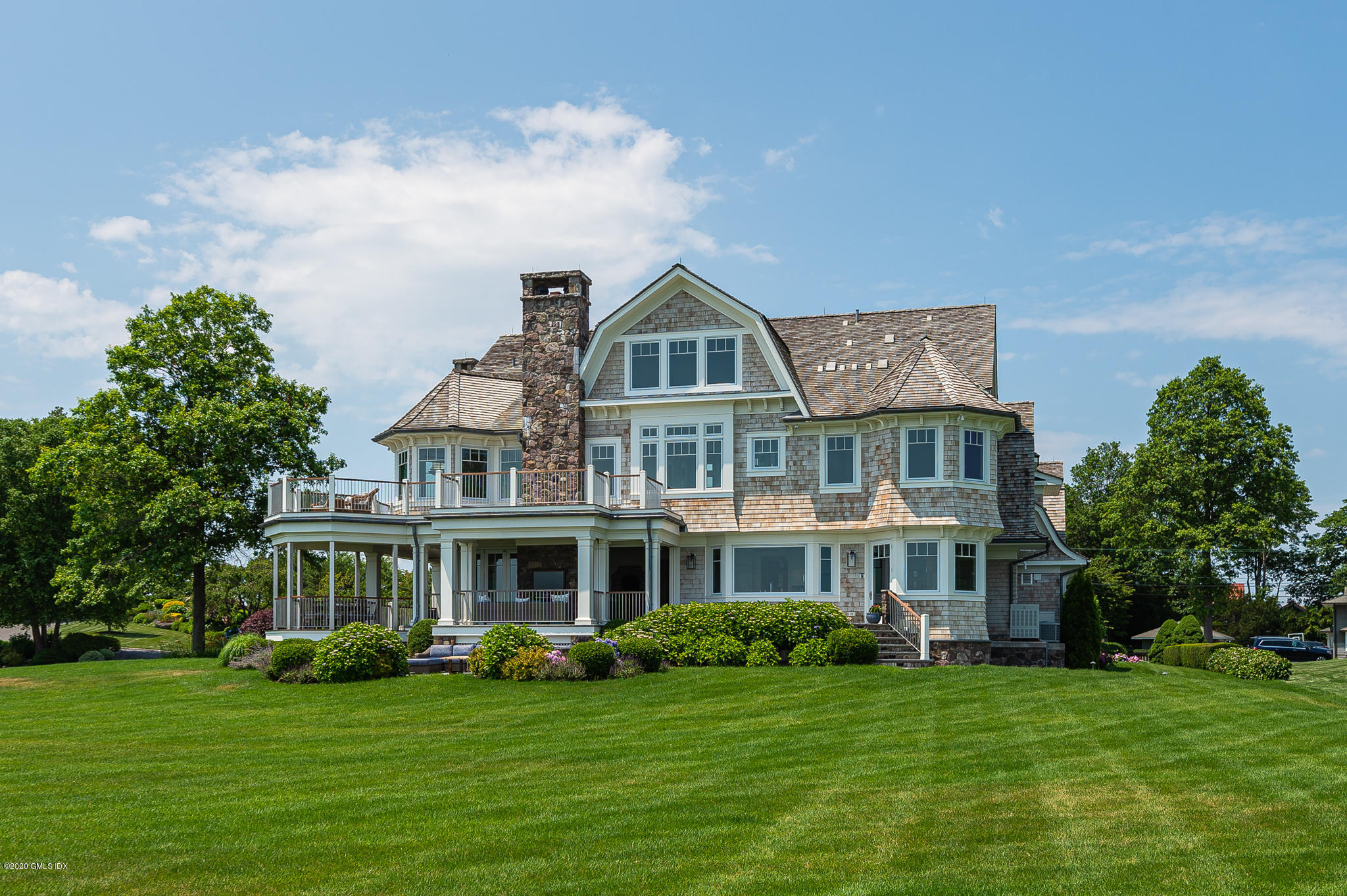 22 Pilot Rock Lane Riverside, CT 06878 - Photo 30 of 40 a front view of a house with a garden