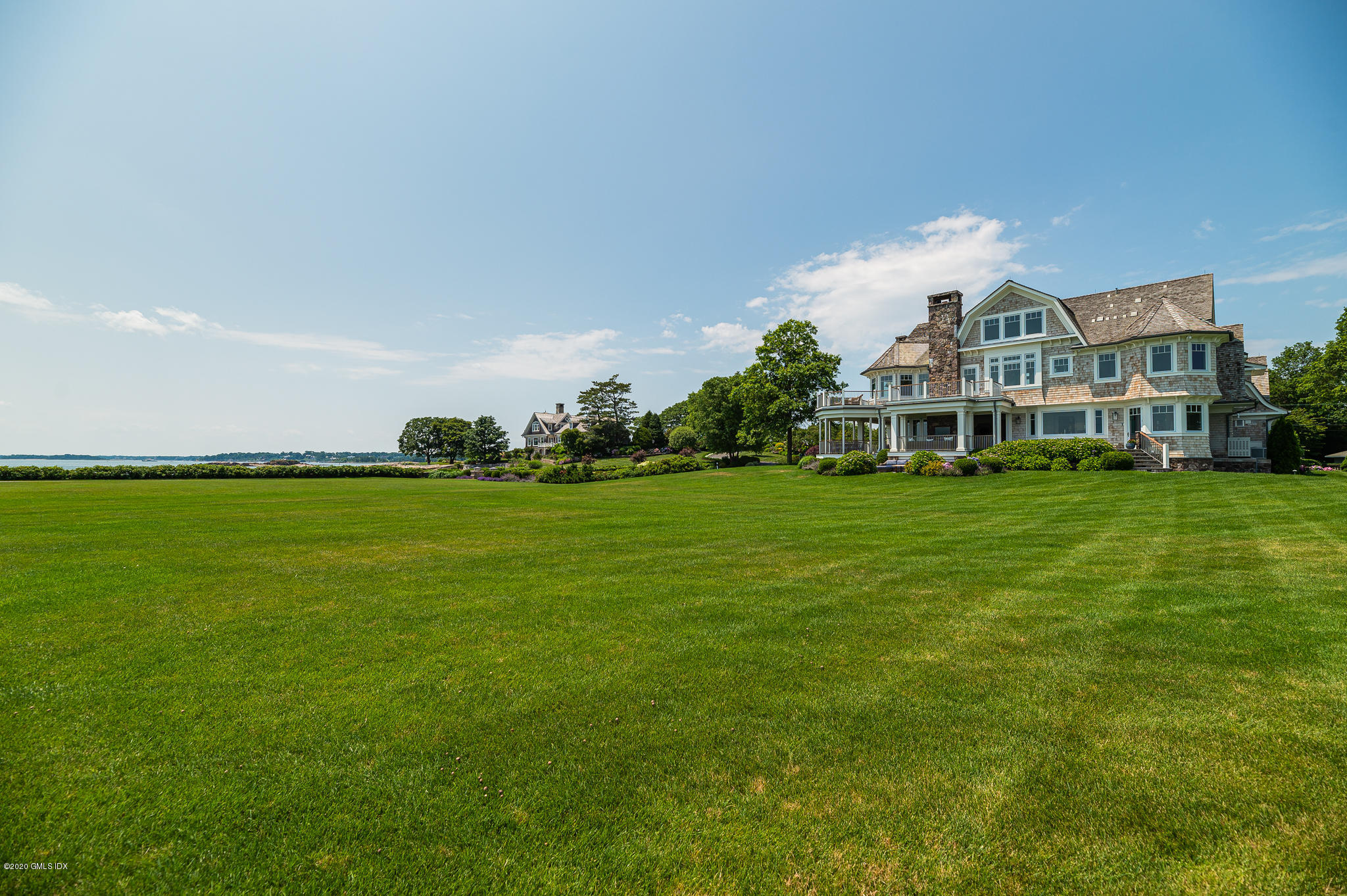 22 Pilot Rock Lane Riverside, CT 06878 - Photo 33 of 40 a view of a house with a big yard