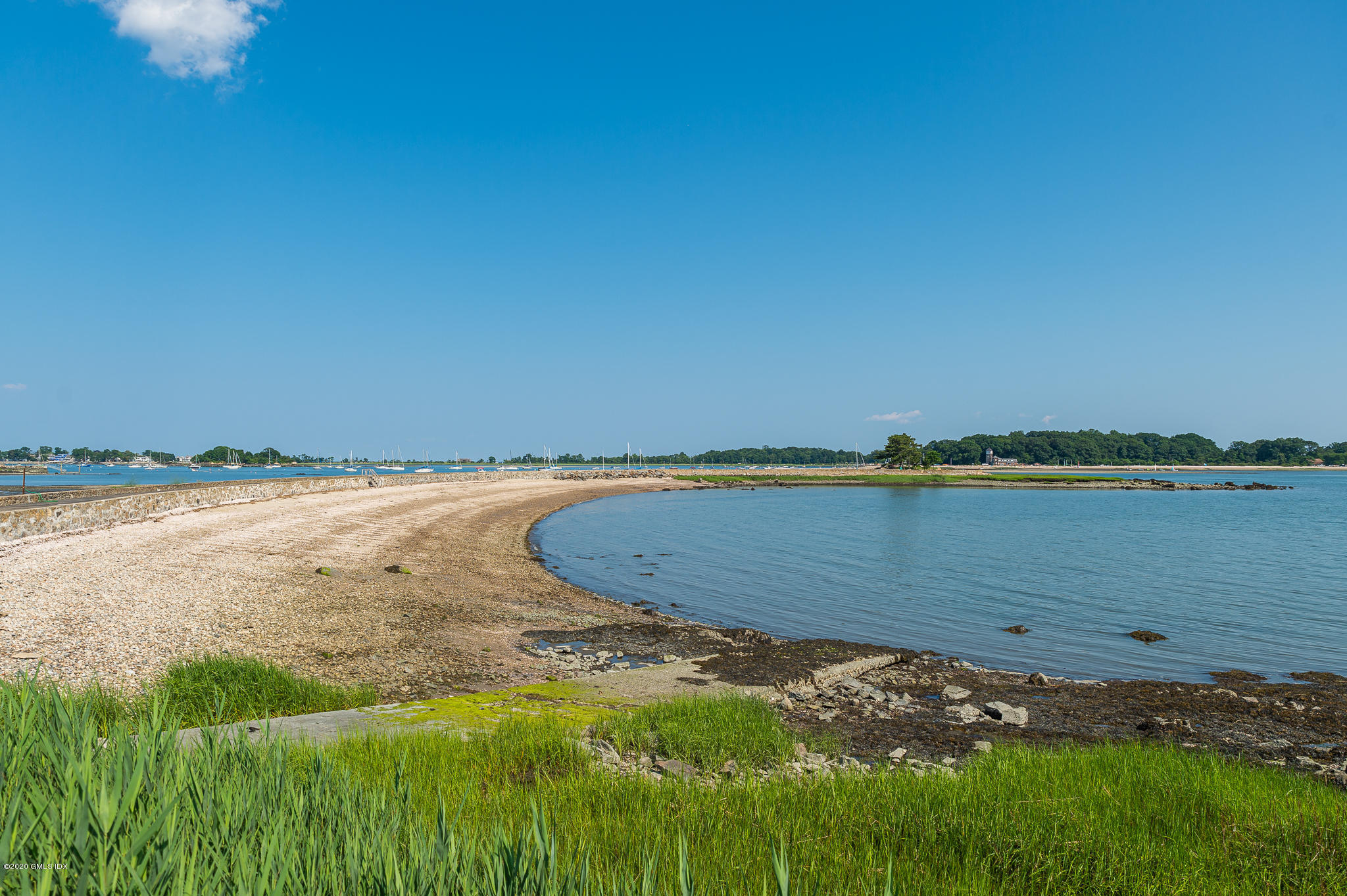 22 Pilot Rock Lane Riverside, CT 06878 - Photo 38 of 40 a view of a lake with a beach