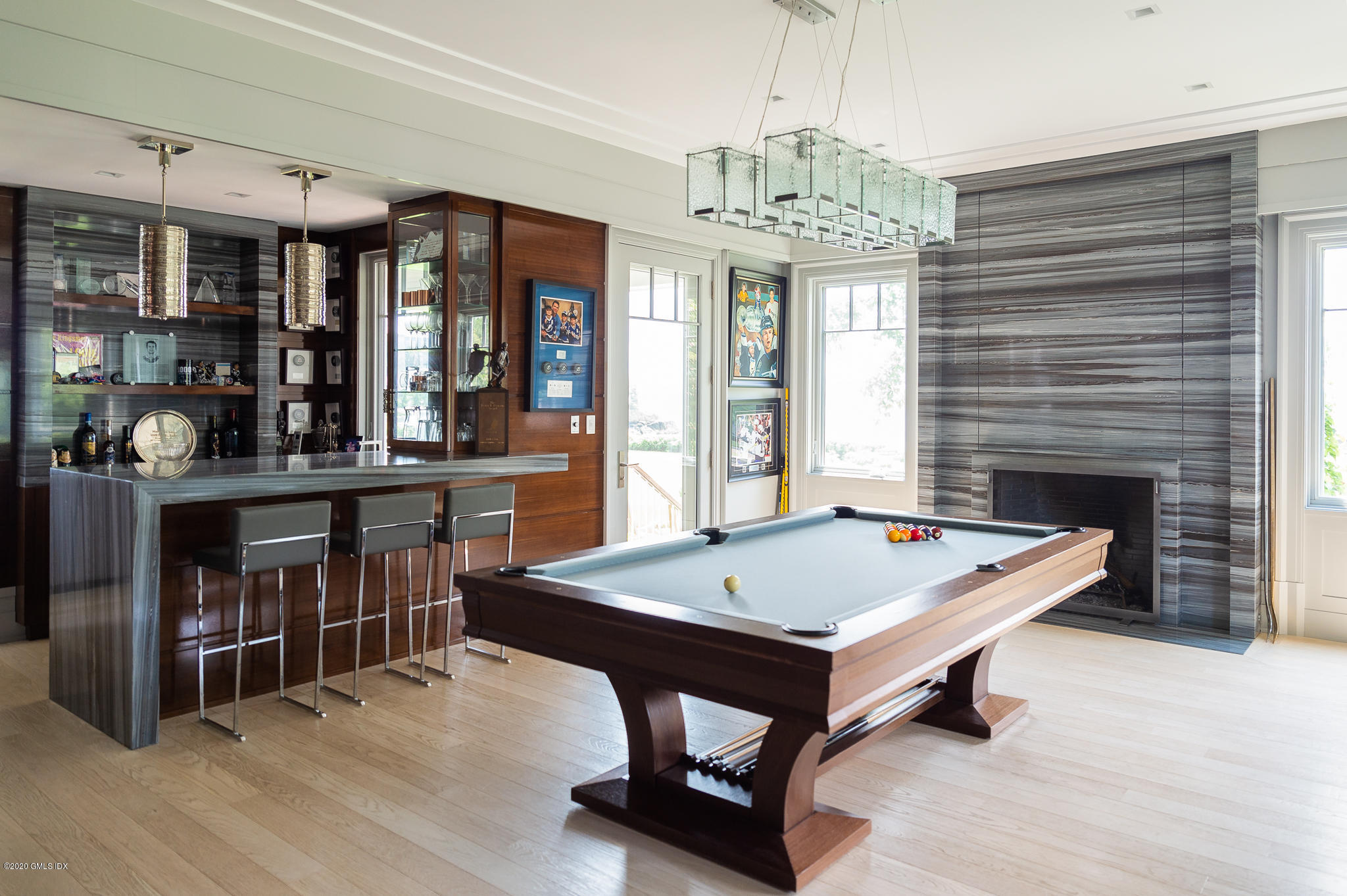 22 Pilot Rock Lane Riverside, CT 06878 - Photo 4 of 40 a room with pool table and windows