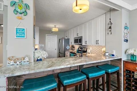 a view of a hallway with entryway